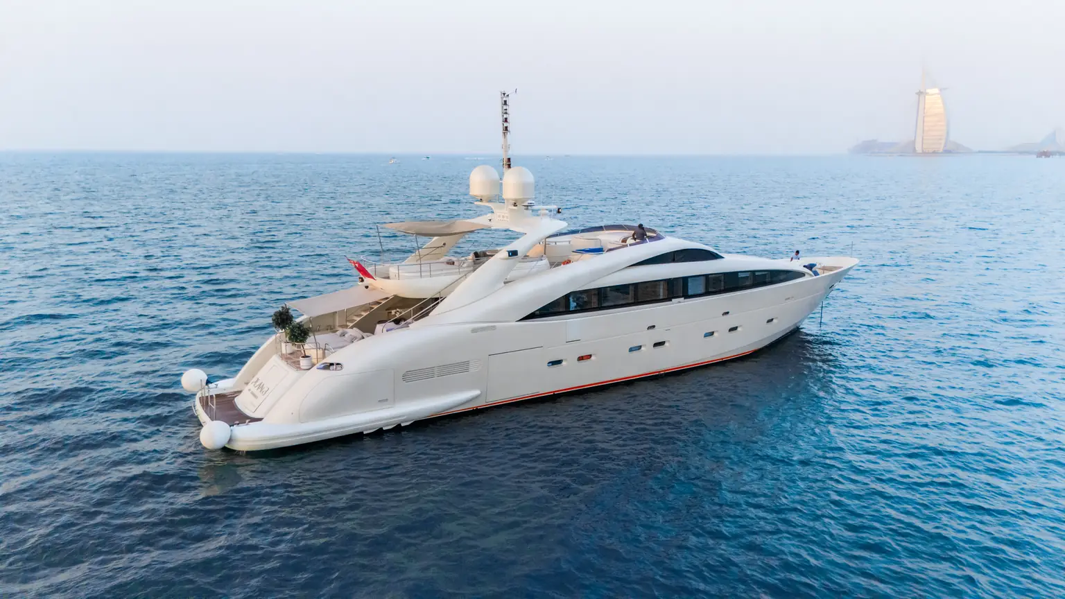 Full starboard profile of the 36 metre Plan B of Freedom at rest on open water