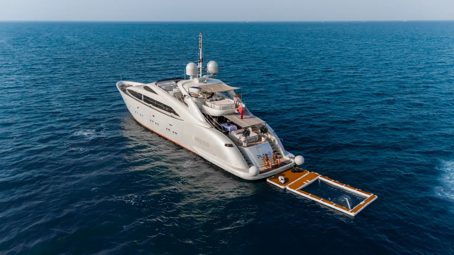 Floating sea pool rigged off the stern of the yacht for swimming