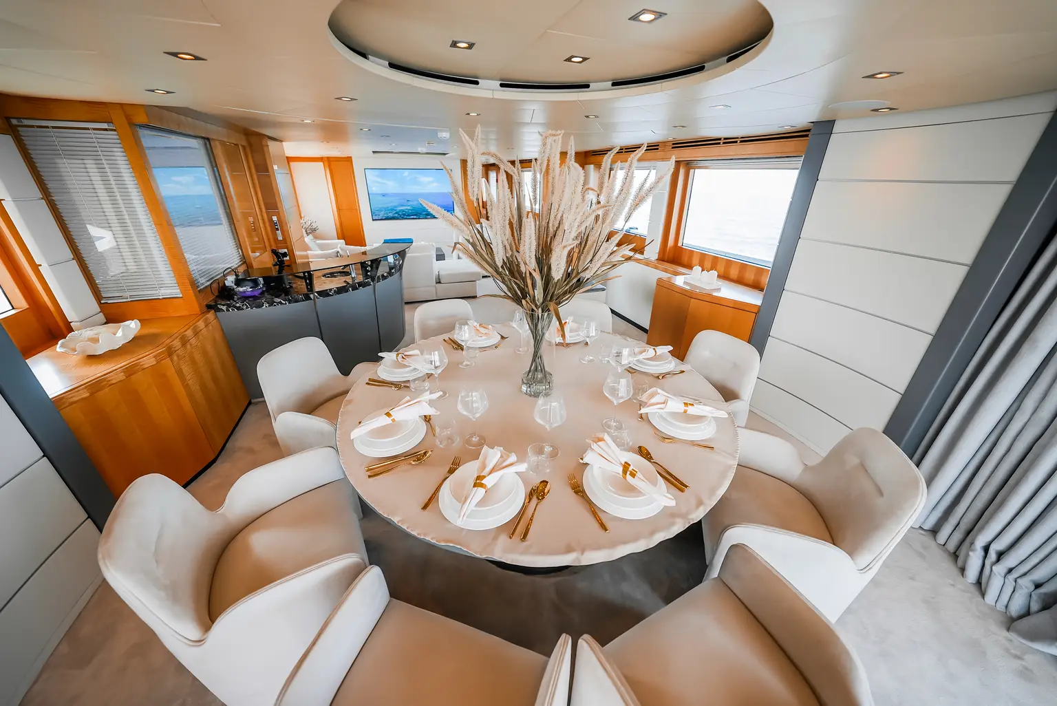 Formal interior dining table laid for eight guests